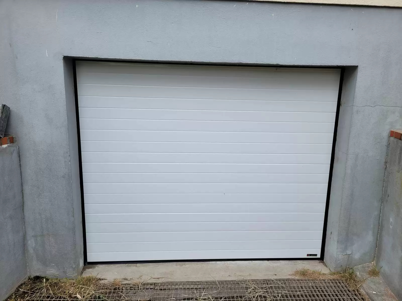 Installation d'une porte de garage motorisé à côté de Dieppe Installation d'une porte de garage motorisé à côté de Dieppe