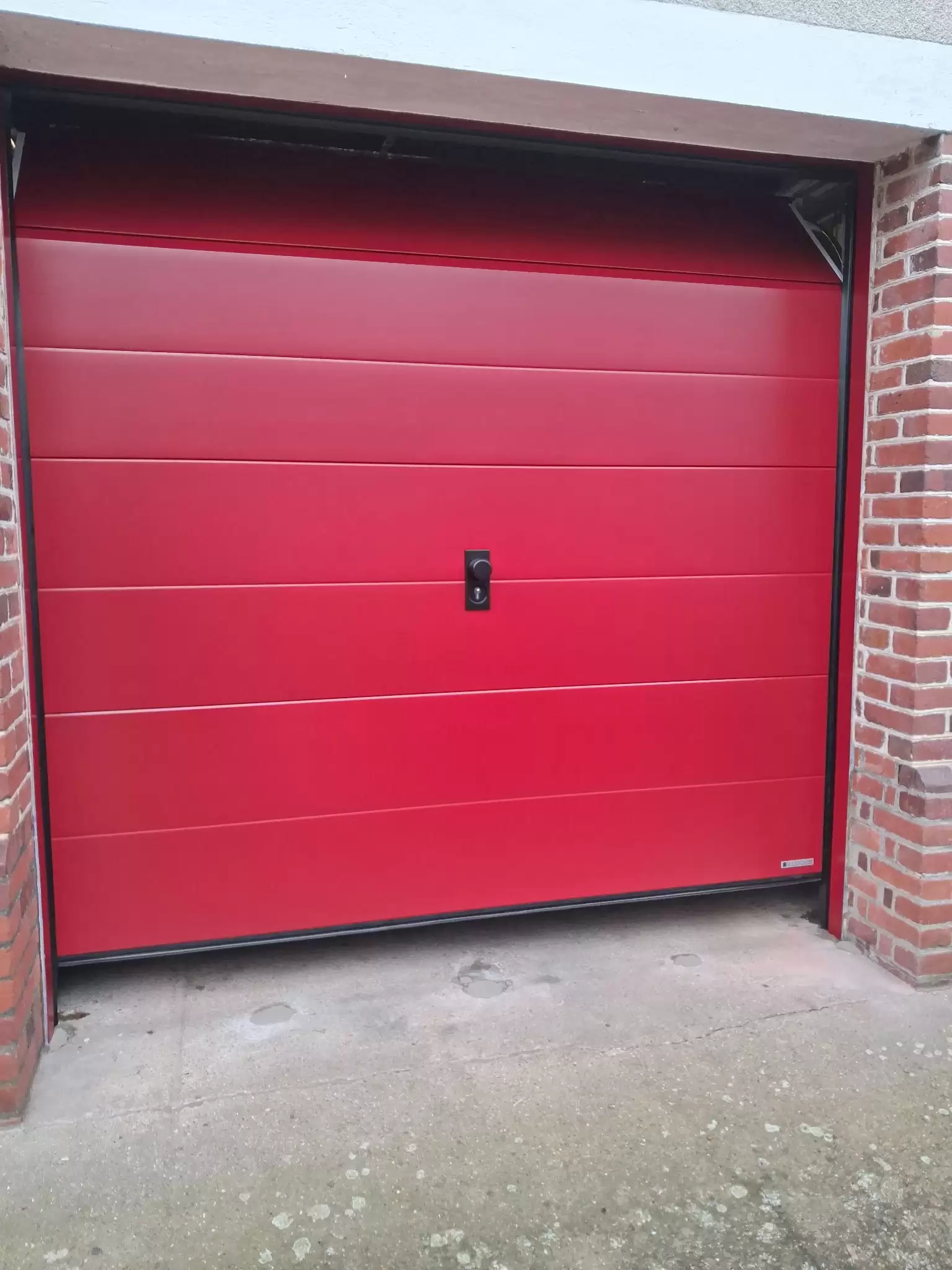 Installation d’une porte de garage sectionnelle à Duclair (76480) Installation d’une porte de garage sectionnelle à Duclair (76480)