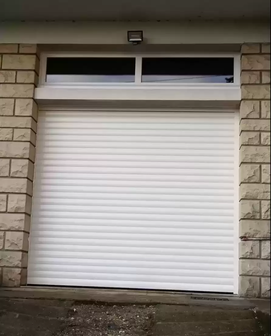 Installer une porte de garage motorisé dans le secteur du Trait 76 Installer une porte de garage motorisé dans le secteur du Trait 76