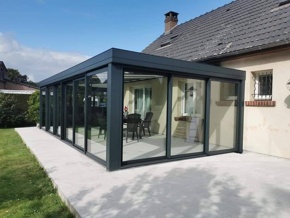 Installation d'une grande véranda en aluminium
