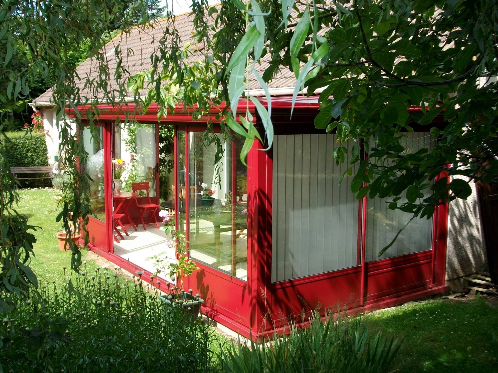 Véranda aluminium rouge proche de Rouen 76