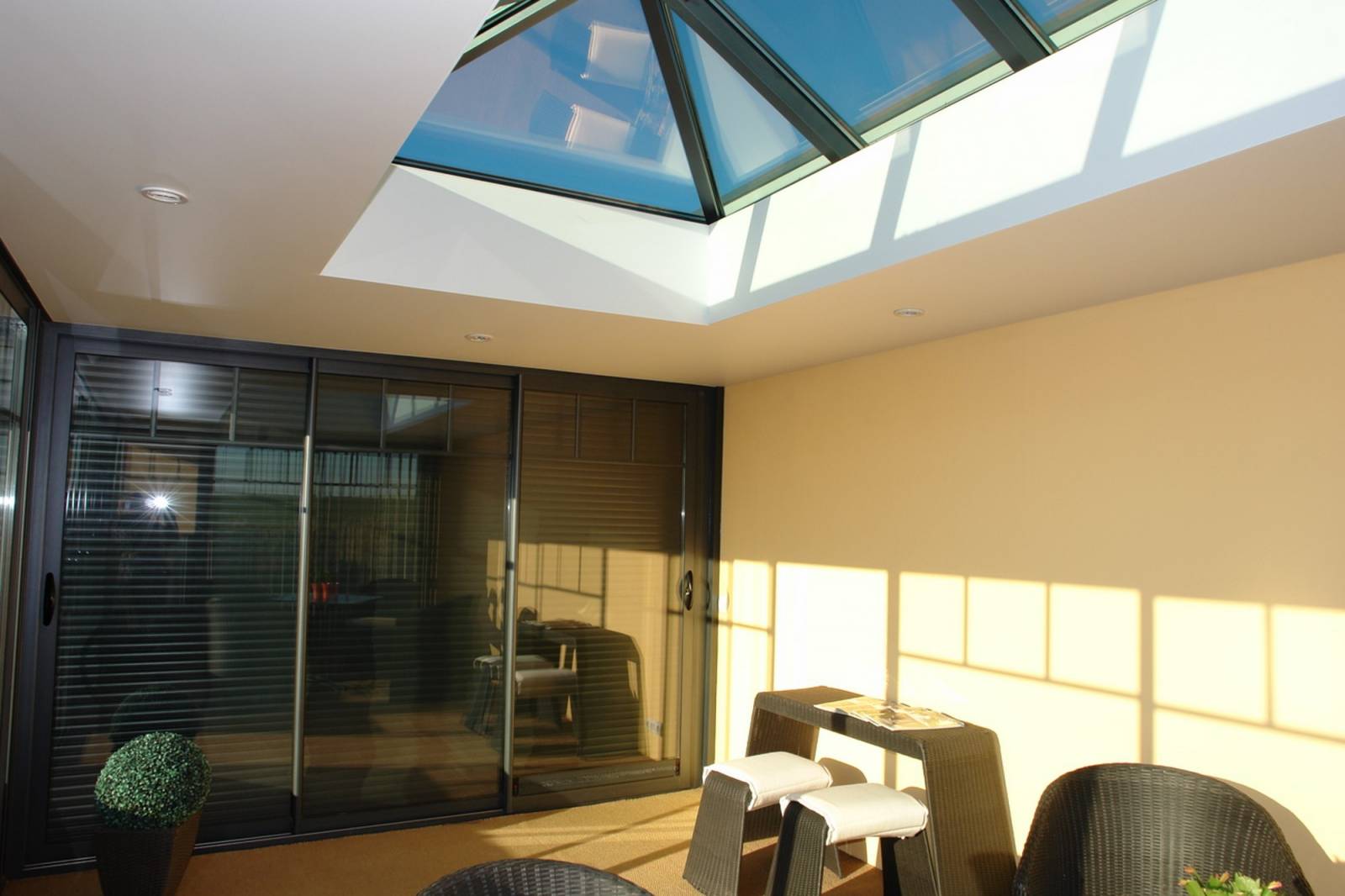 Véranda avec verrière en toiture proche de Rouen 76