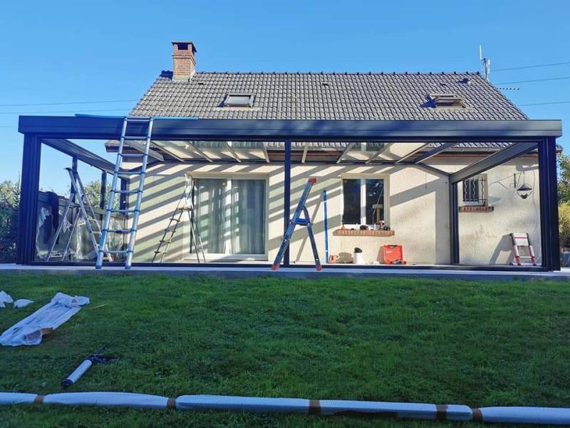 Installation d'une grande véranda en aluminium