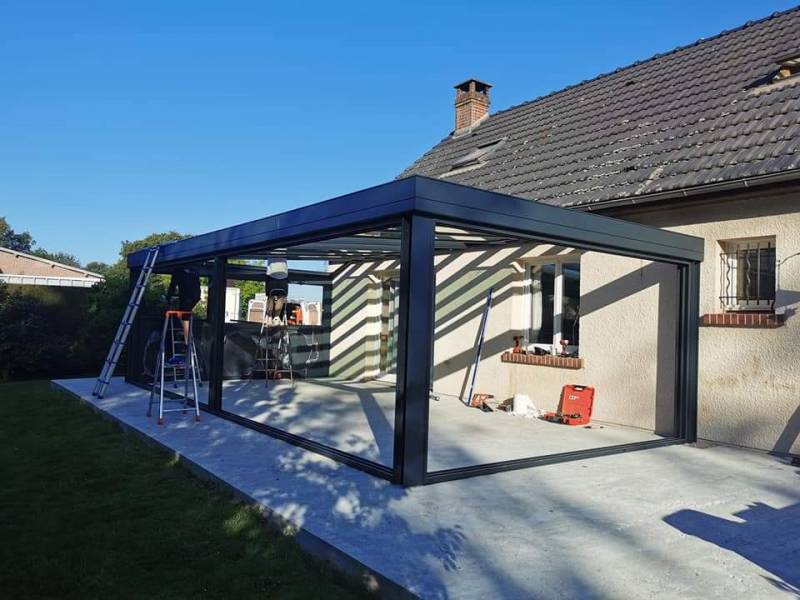 Installation d'une grande véranda en aluminium