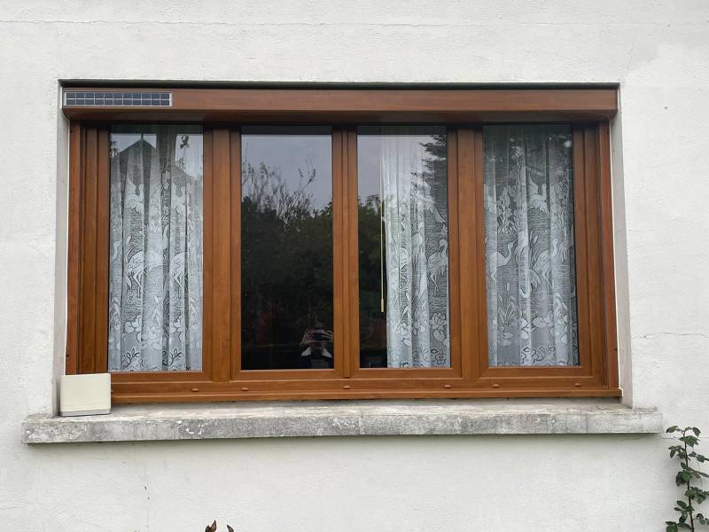 Pose de fenêtres en PVC chênes dorés à Anneville Ambourville proche de Rouen