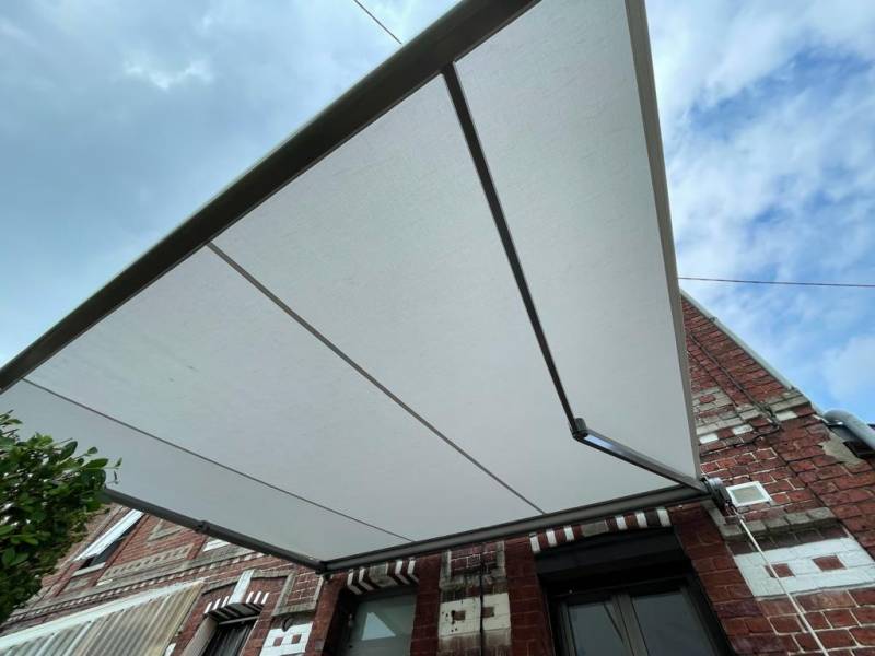 Pose d'un store banne à Rouen 76 