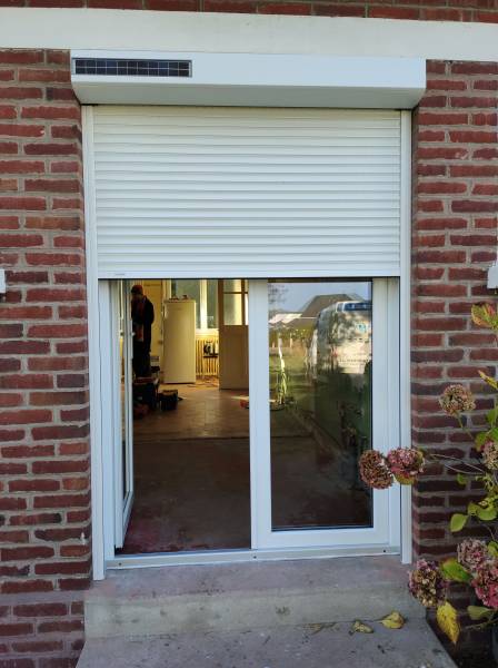 Installation d’une porte fenêtre et d’un volet roulant solaire à Quiberville