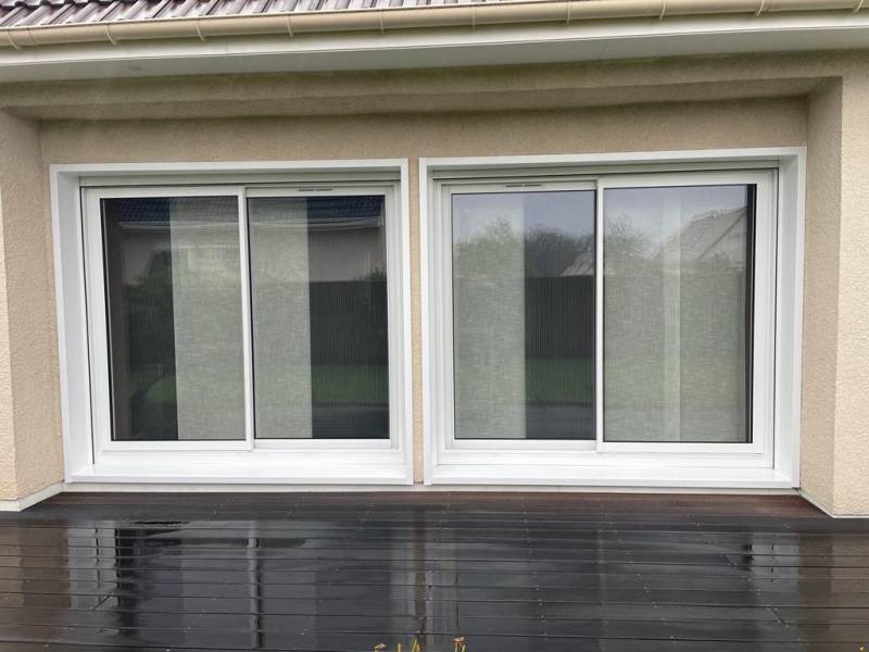 Installation de coulissant aluminium 2 vantaux à côté de Tourville-la-rivière 76