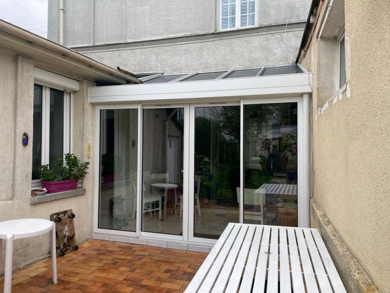 Fourniture et pose d’une véranda blanche en aluminium à Rouen dans le 76
