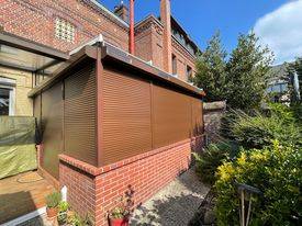 Installation de volets roulants solaires sur une véranda à Rouen 76